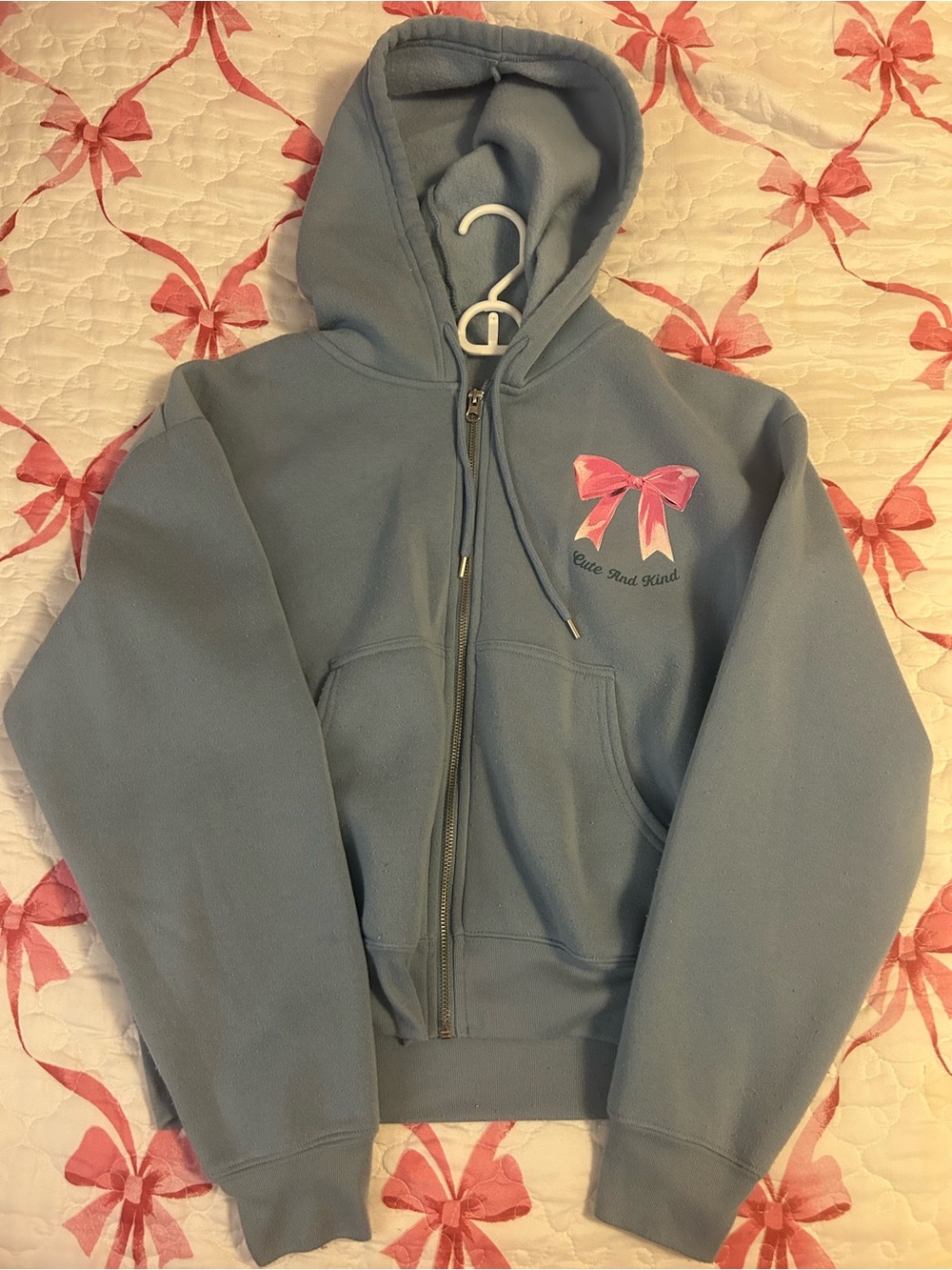 Cute And Kind Light Blue Zip-Up Hoodie with Pink Bow Detail